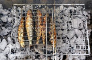 Grilled Sardines on BBQ Charcoal by Theo Michaels